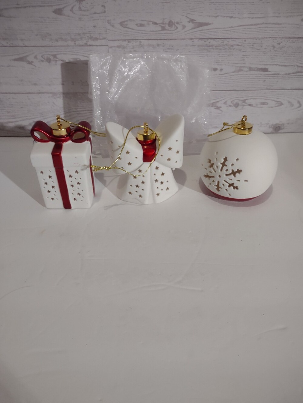 Winter Lane set of three white translucent ceramic Christmas ornaments